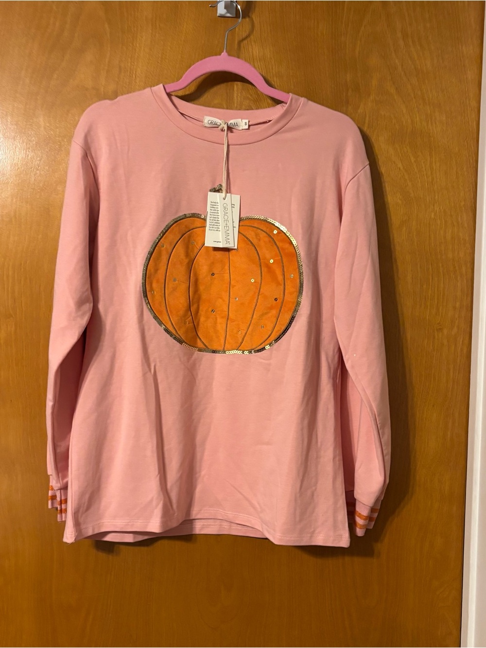 Women’s Pink Long-Sleeve Sweatshirt with Orange Pumpkin Applique - - Picture 1 of 4